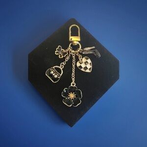 Black floral bag charm